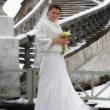 Красивая невеста у лестницы
